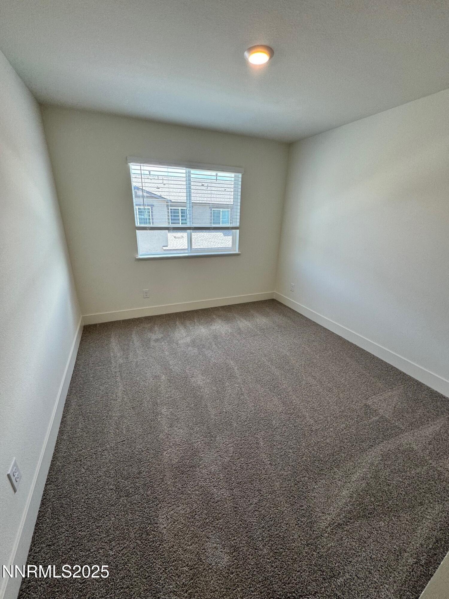 1615 Prancer Street, Unit LOT #53 Reno, NV 89523 - Photo 9 of 34 an empty room with windows