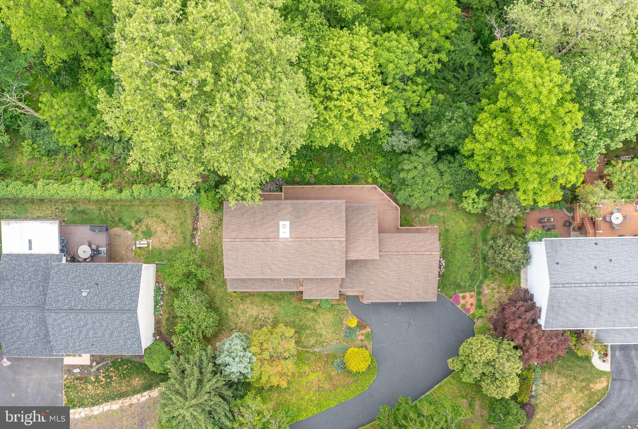 40 Golfview Lane Reading, PA 19606 - Photo 43 of 48 an aerial view of a house with a garden and a yard