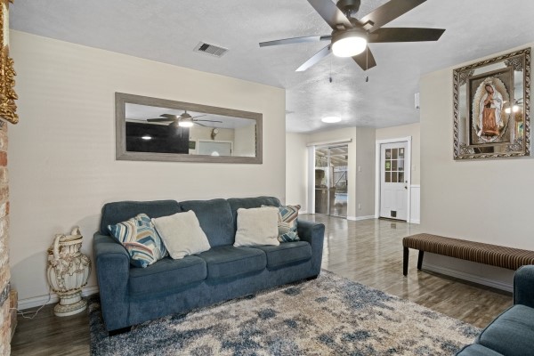 9702 Tiltree Street Houston, TX 77075 - Photo 2 of 24 a living room with furniture and a couch