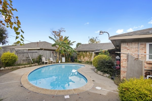 9702 Tiltree Street Houston, TX 77075 - Photo 21 of 24 a view of house with yard and outdoor seating