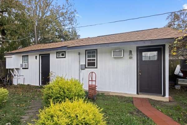 9702 Tiltree Street Houston, TX 77075 - Photo 23 of 24 a front view of house with yard