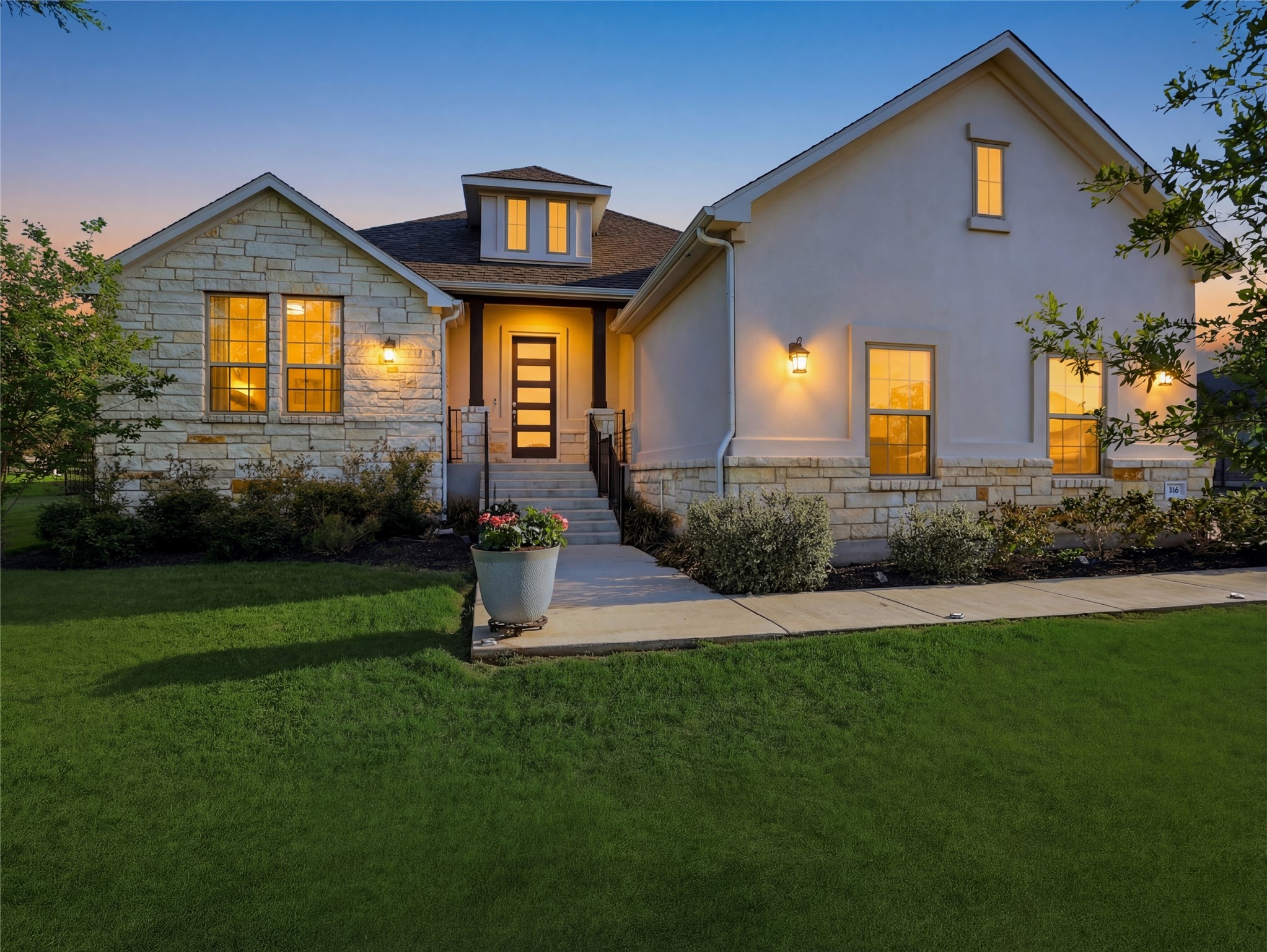 316 Raptor Beak Way Cedar Creek, TX 78612 - Photo 2 of 30 a front view of a house with a yard
