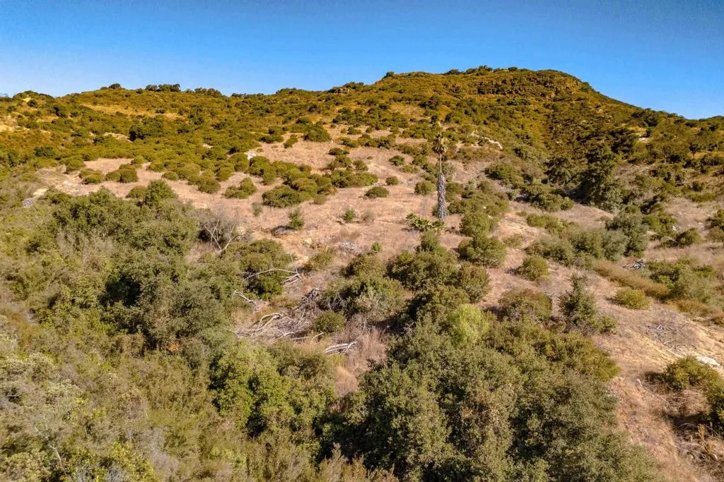 28 El Calamar Road Temecula, CA 92590 - Photo 18 of 33 a view of a large mountain with mountains in the background