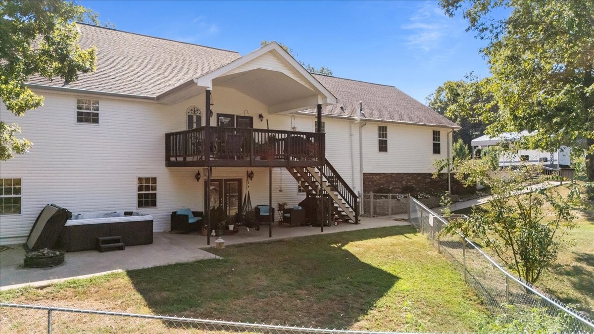 116 Stewart Lane Waverly, TN 37185 - Photo 62 of 87 a view of a house with backyard porch and sitting area