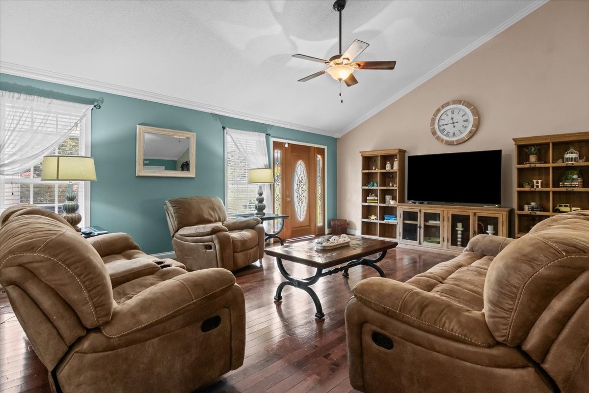 116 Stewart Lane Waverly, TN 37185 - Photo 8 of 87 a living room with furniture a ceiling fan and a flat screen tv