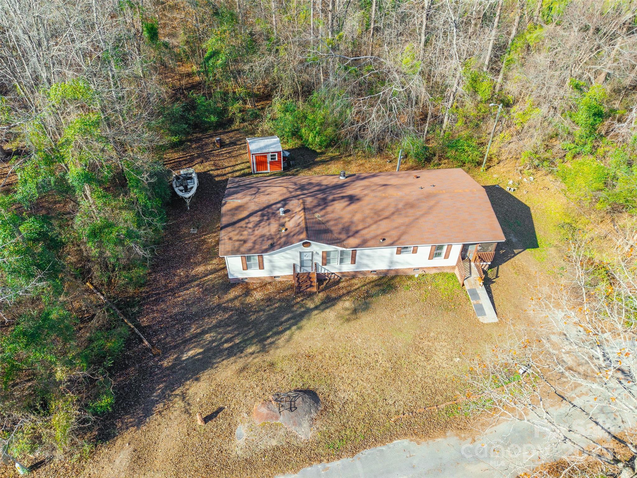 551 Arrowwood Road Great Falls, SC 29055 - Photo 9 of 12 a view of a swimming pool with a yard