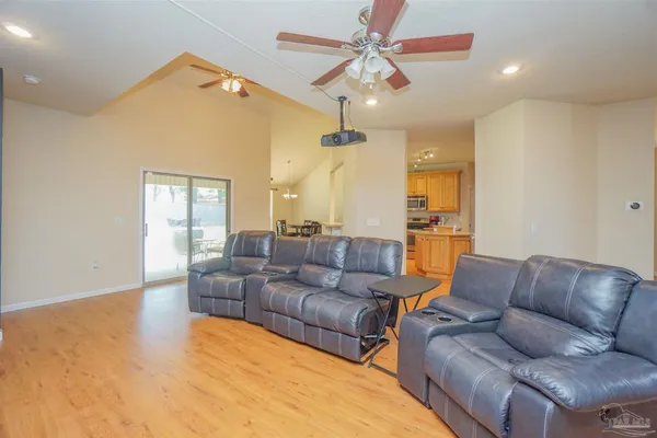 a living room with furniture a chandelier