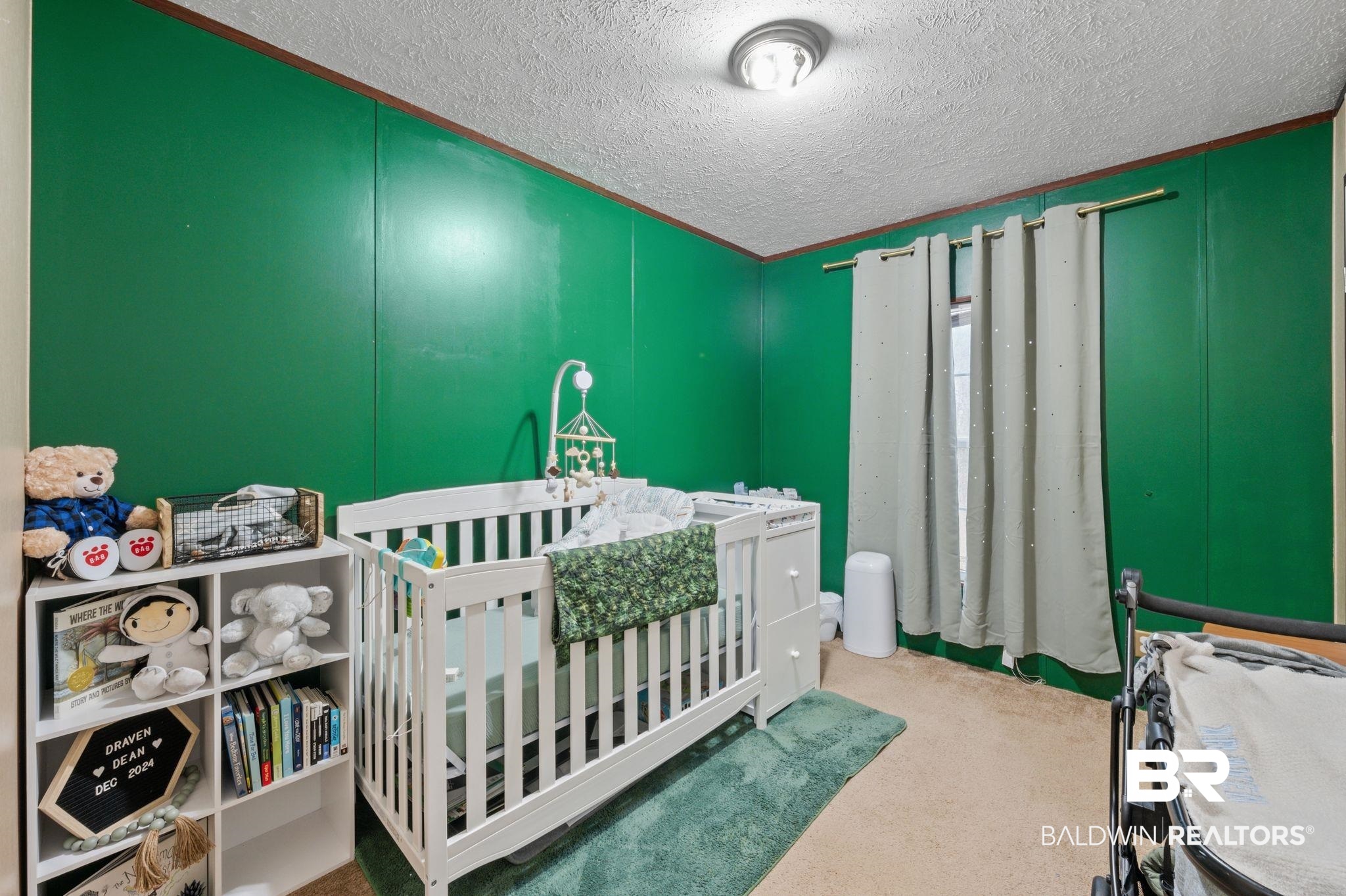 39908 T A Chastang Road Bay Minette, AL 36507 - Photo 14 of 20 Carpeted bedroom featuring a textured ceiling and a crib