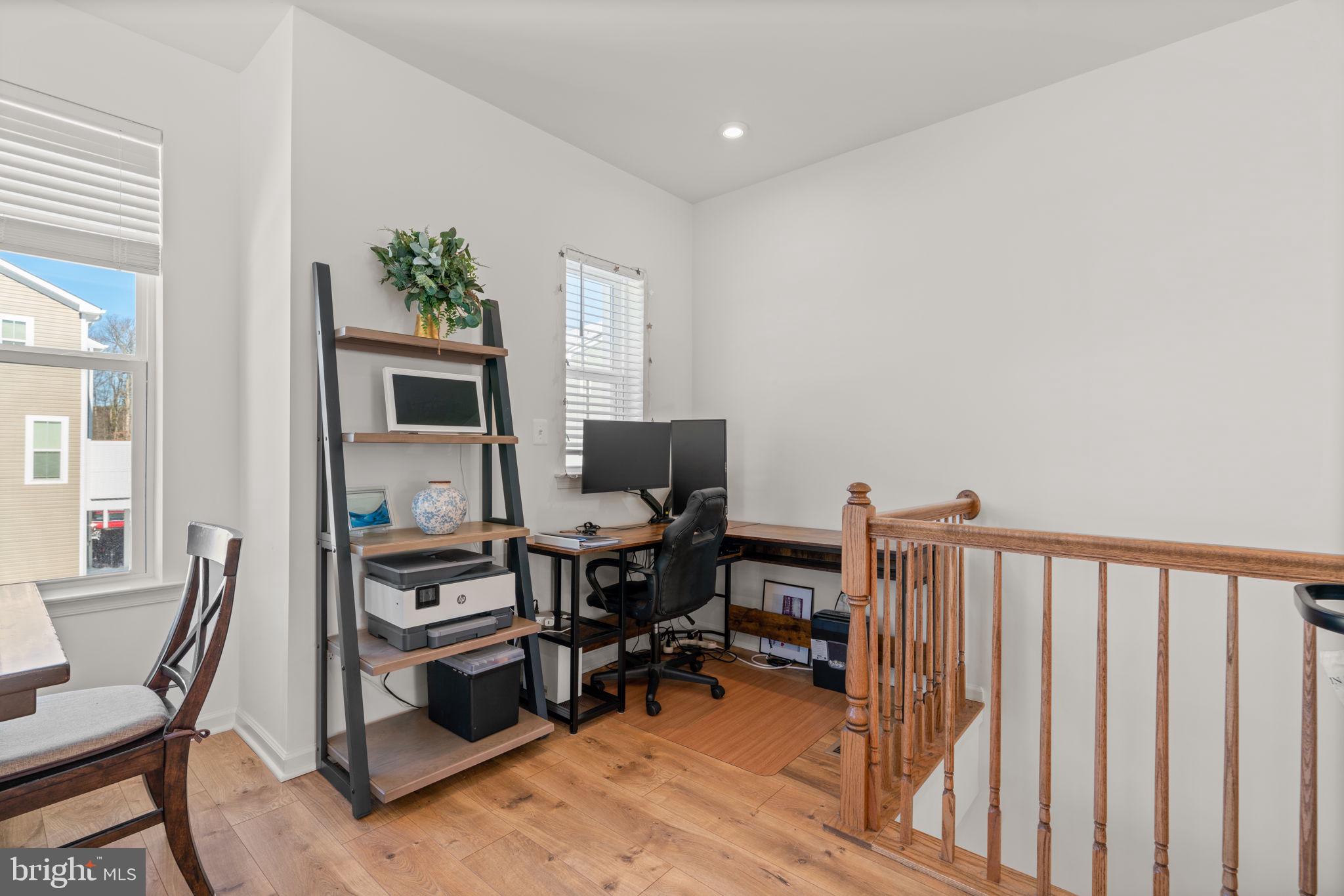 1605 Aster Lane Hanover, MD 21076 - Photo 14 of 44 a workspace with furniture and rug