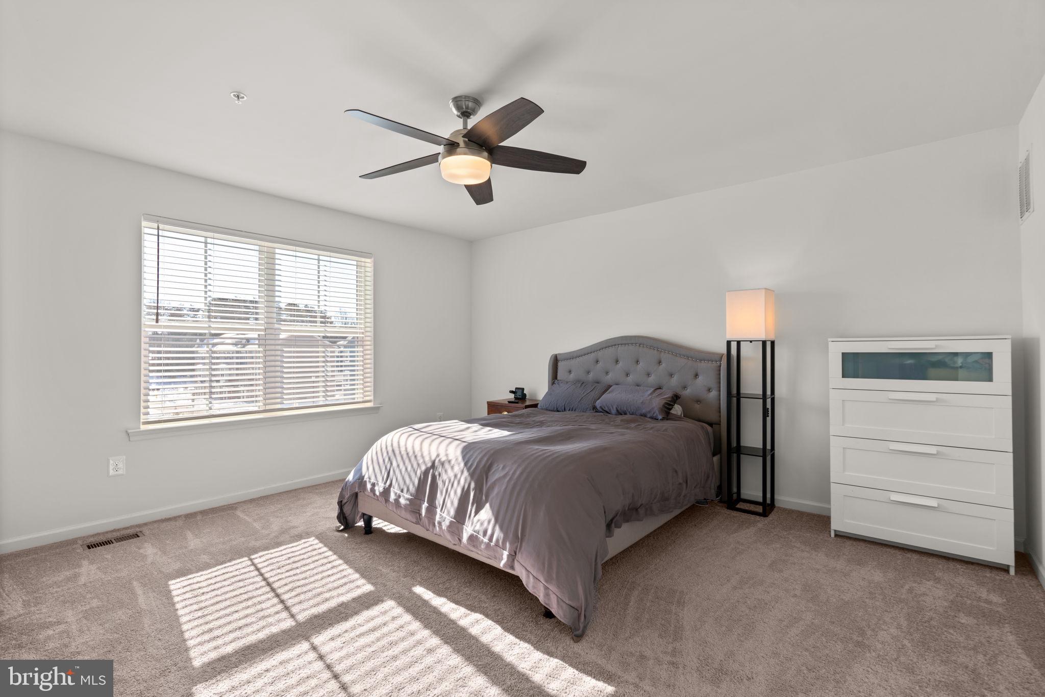 1605 Aster Lane Hanover, MD 21076 - Photo 20 of 44 a bedroom with a bed and a window