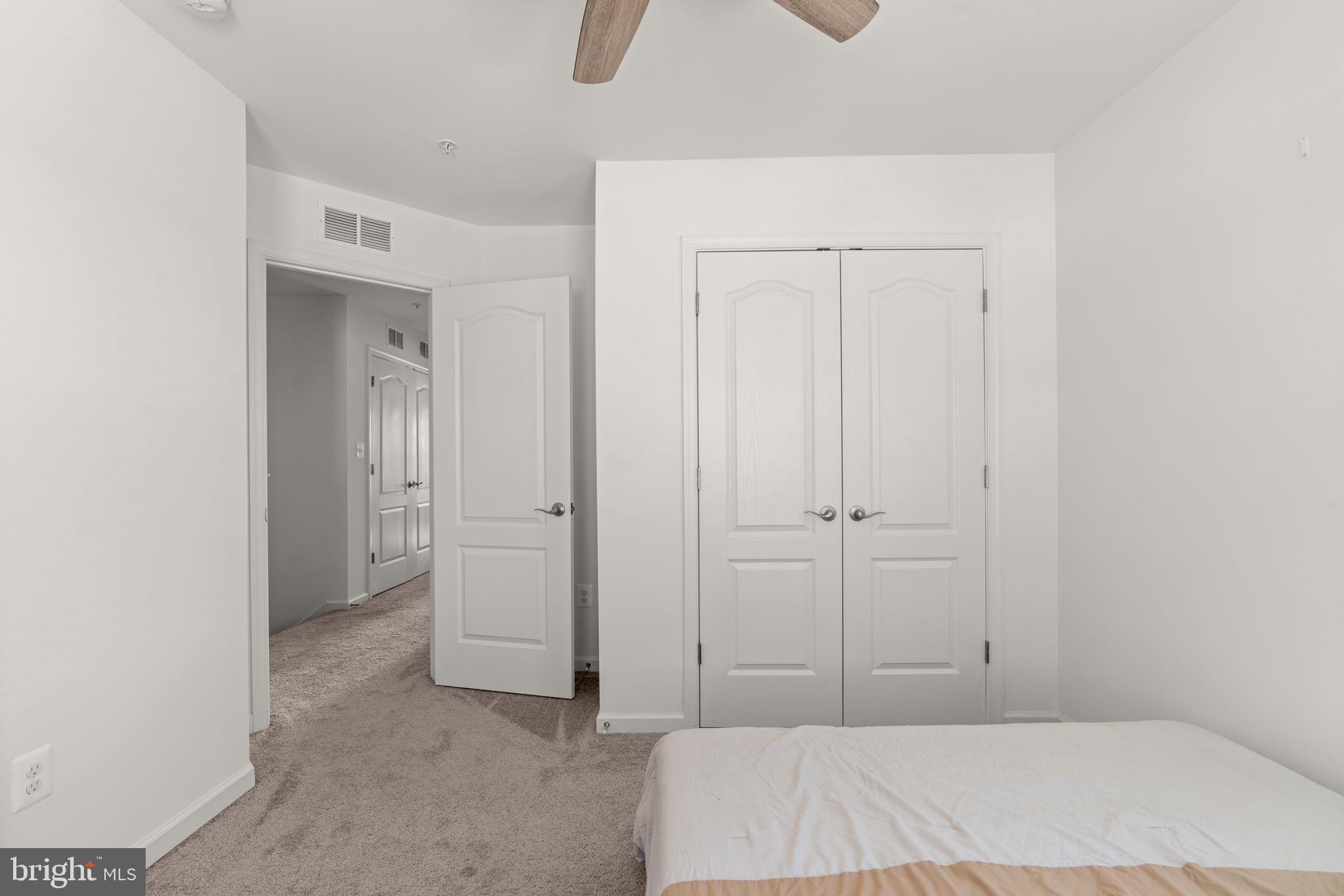 1605 Aster Lane Hanover, MD 21076 - Photo 31 of 44 a bedroom with a bed and a cabinet