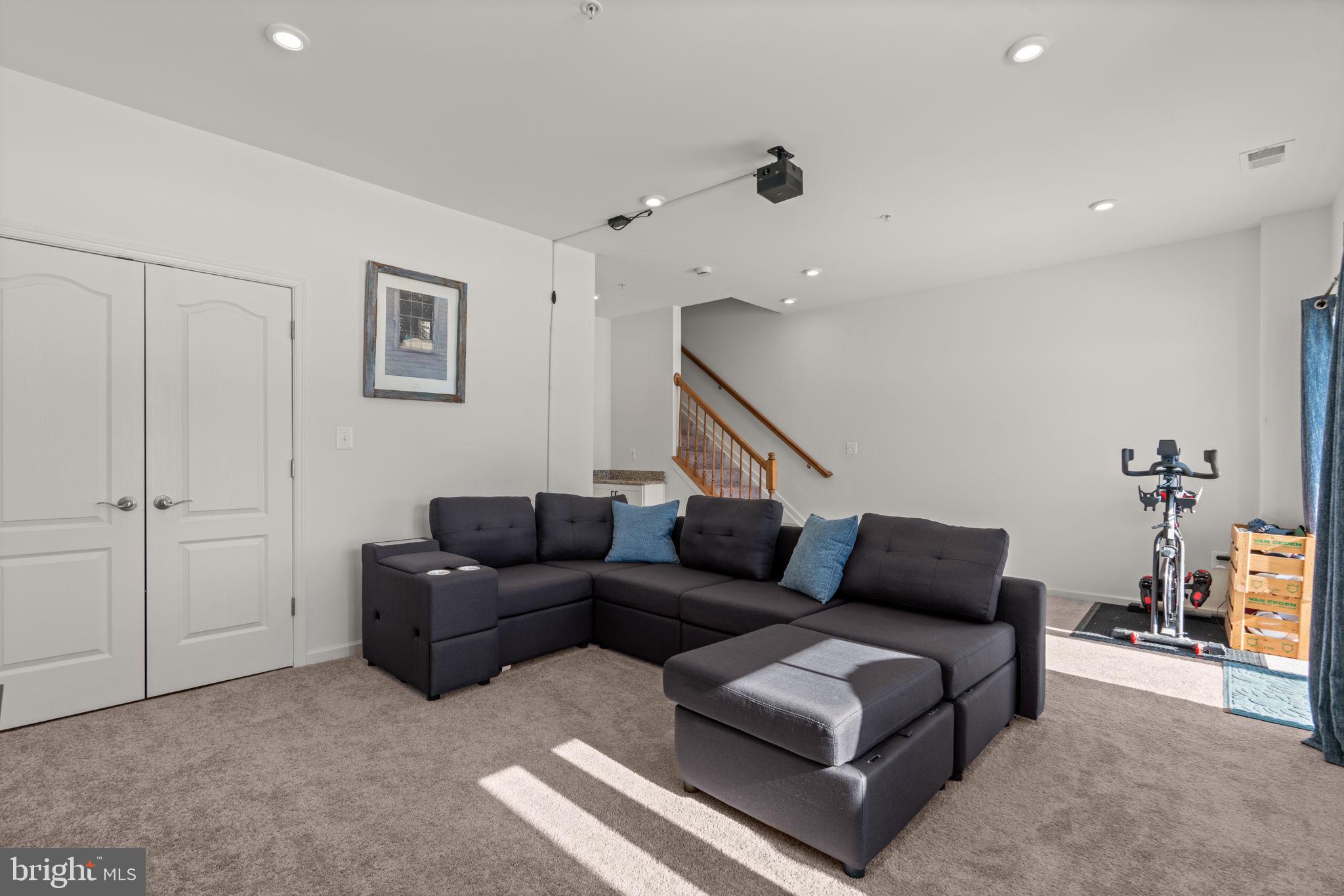 1605 Aster Lane Hanover, MD 21076 - Photo 35 of 44 a living room with furniture and a couch
