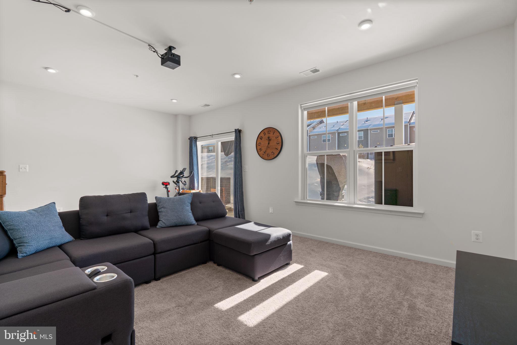 1605 Aster Lane Hanover, MD 21076 - Photo 36 of 44 a living room with furniture and window