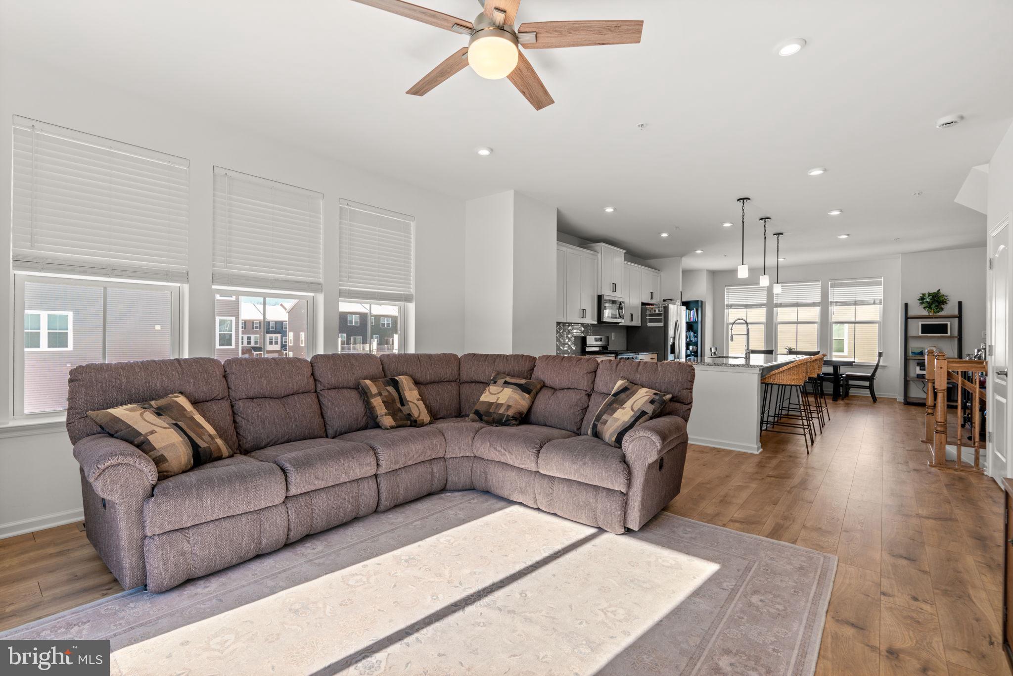 1605 Aster Lane Hanover, MD 21076 - Photo 8 of 44 a living room with furniture and kitchen view