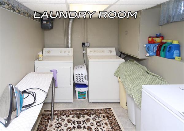 26 Granger Street Springfield, MA 01119 - Photo 14 of 18 a utility room with dryer and washer