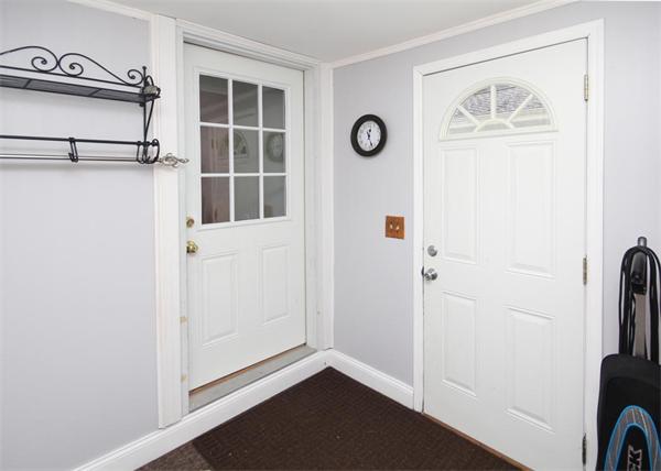 26 Granger Street Springfield, MA 01119 - Photo 15 of 18 a view of front door with wooden floor