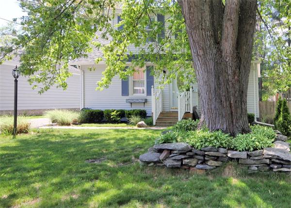 26 Granger Street Springfield, MA 01119 - Photo 2 of 18 a view of a garden with a tree