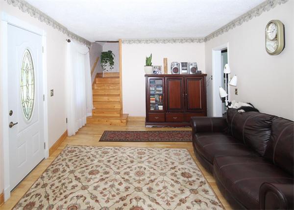 26 Granger Street Springfield, MA 01119 - Photo 3 of 18 a living room with furniture and a rug