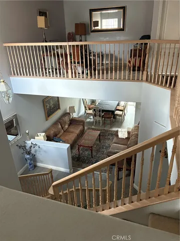 a view of roof deck with furniture