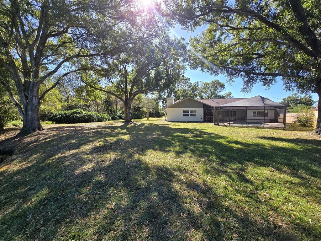 2940 Cypress Ridge Palm Harbor, FL 34684 - Photo 11 of 53 a view of a house with a yard