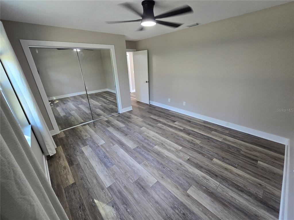 2940 Cypress Ridge Palm Harbor, FL 34684 - Photo 15 of 53 wooden floor in an empty room