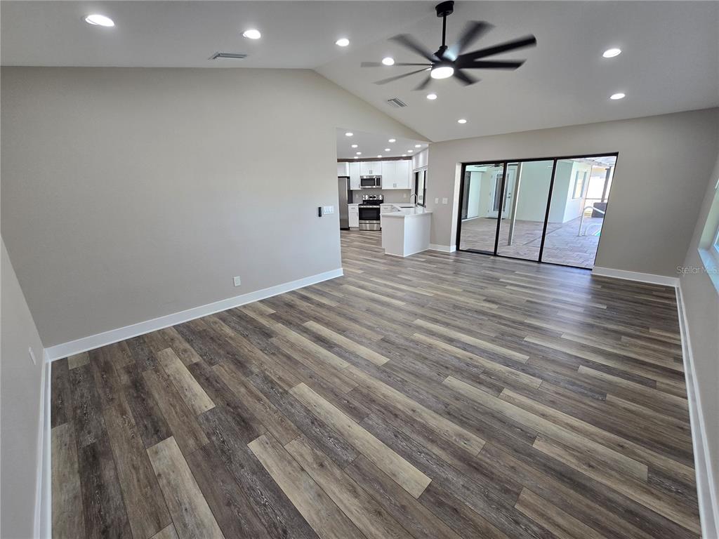 2940 Cypress Ridge Palm Harbor, FL 34684 - Photo 2 of 53 wooden floor in an empty room with a window