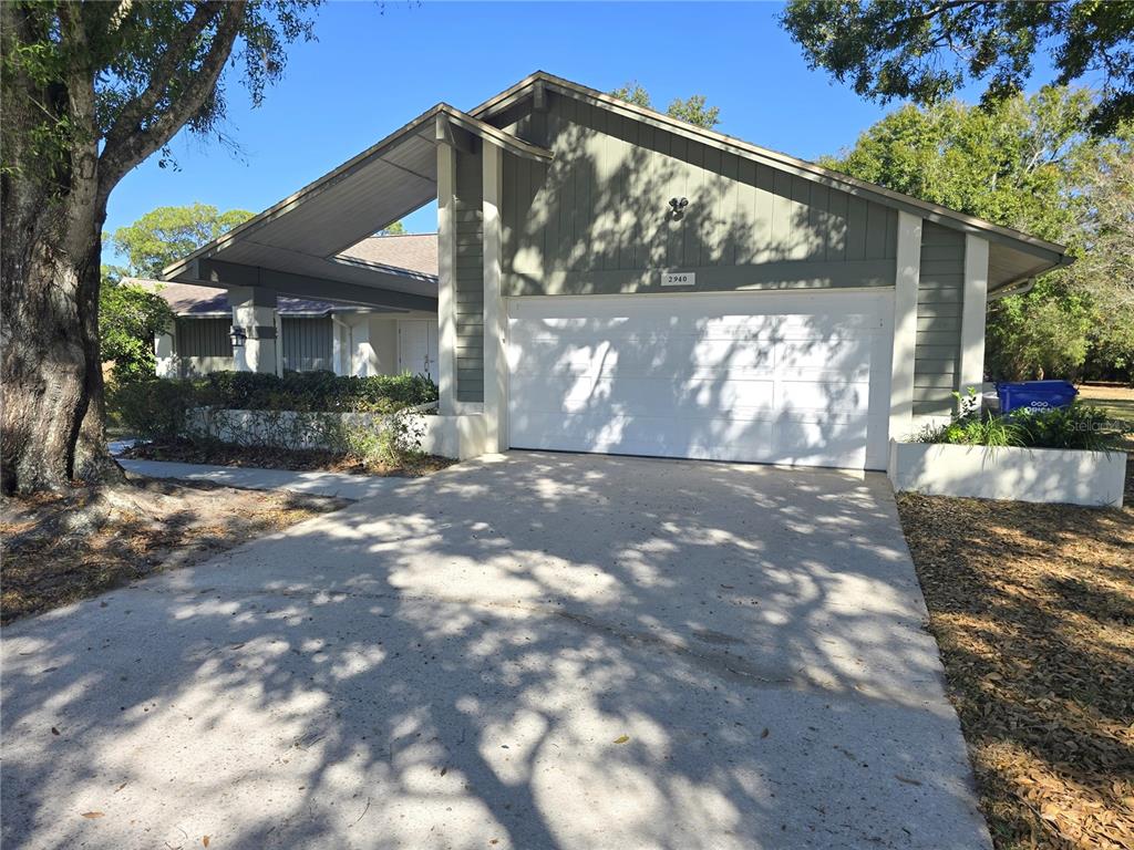 2940 Cypress Ridge Palm Harbor, FL 34684 - Photo 22 of 53 a view of a house with a yard