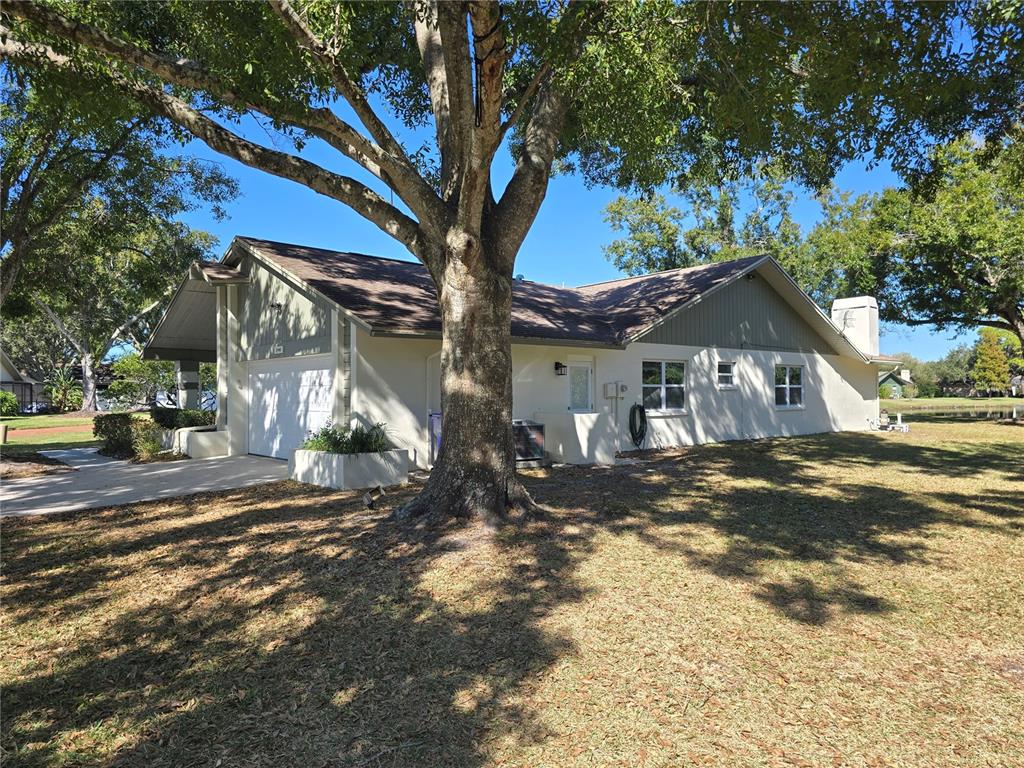 2940 Cypress Ridge Palm Harbor, FL 34684 - Photo 25 of 53 a view of a house with a yard
