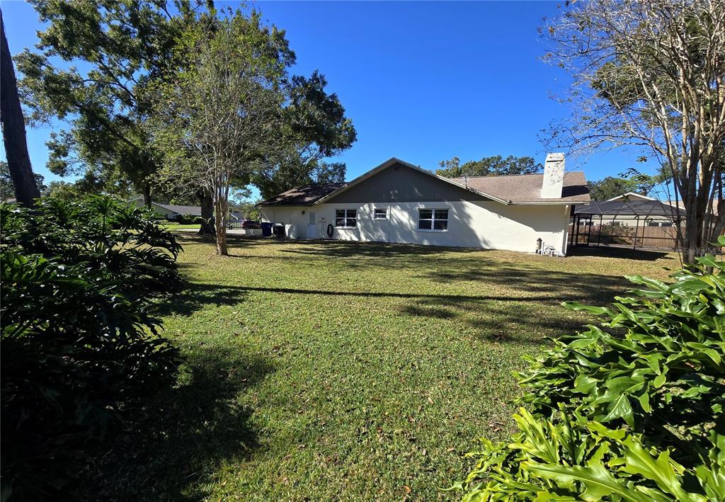 2940 Cypress Ridge Palm Harbor, FL 34684 - Photo 26 of 53 a view of a house with a big yard