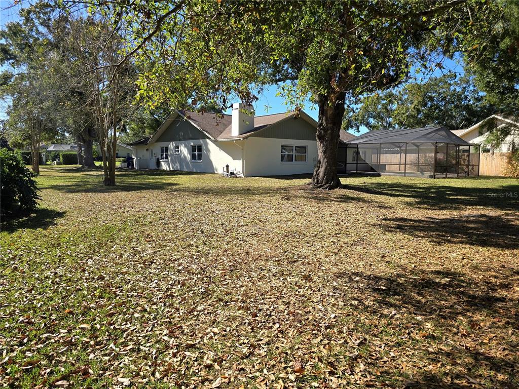 2940 Cypress Ridge Palm Harbor, FL 34684 - Photo 27 of 53 a house with trees in front of it