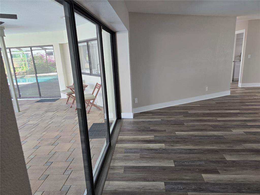 2940 Cypress Ridge Palm Harbor, FL 34684 - Photo 45 of 53 a view of a livingroom with wooden floor and stairs