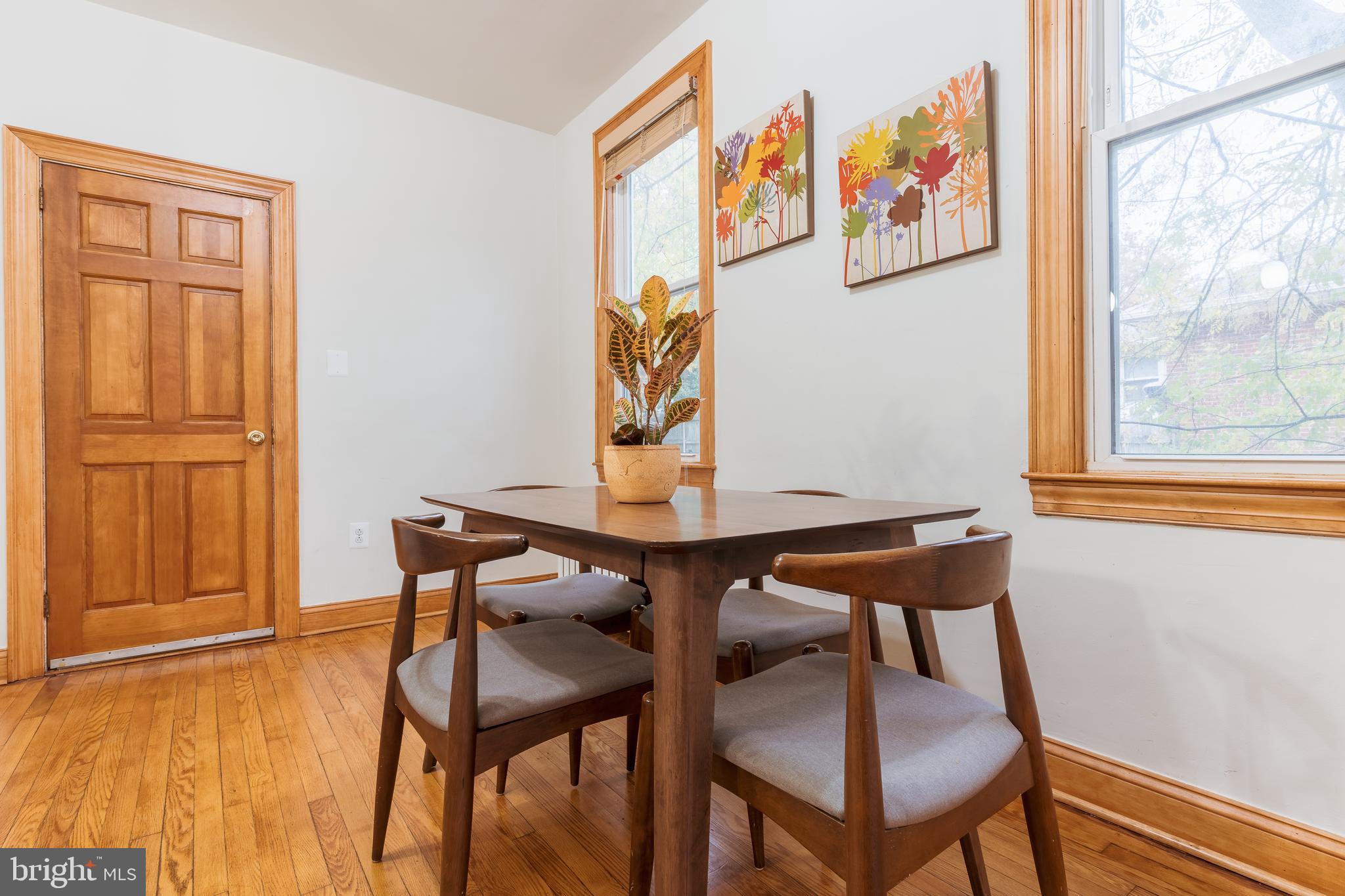 3817 22nd Street Northeast Washington, DC 20018 - Photo 13 of 37 a view of a room that has a table and chair in it