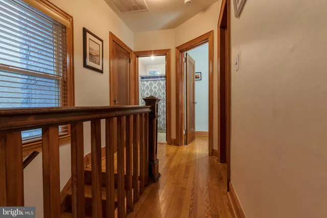 a view of a porch with wooden floor