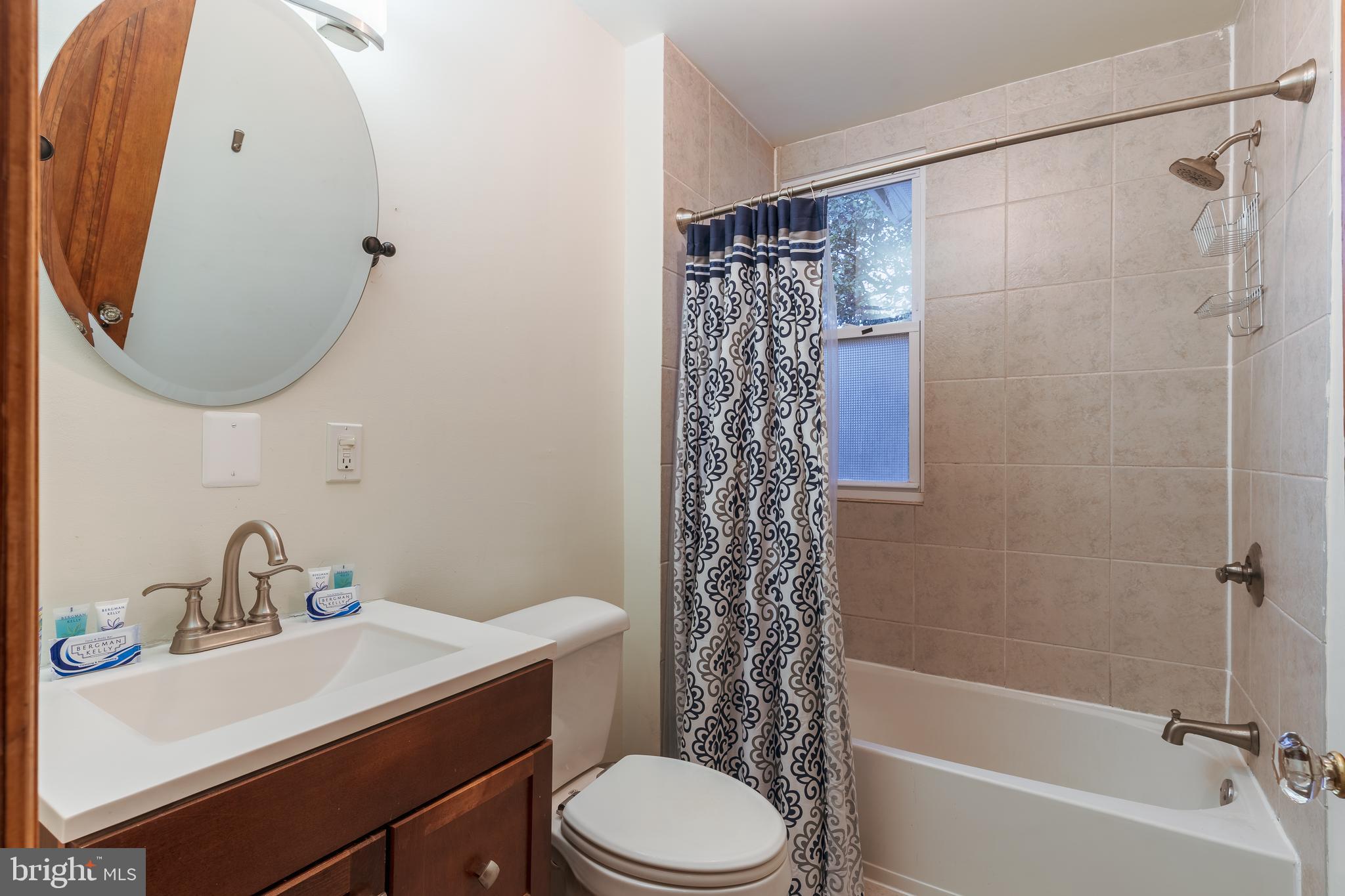 3817 22nd Street Northeast Washington, DC 20018 - Photo 29 of 37 a bathroom with a sink toilet and shower