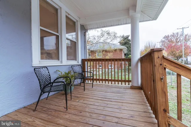 a view of a chairs on the roof deck