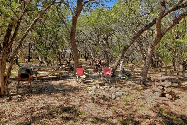 an aerial view of residential house with outdoor space