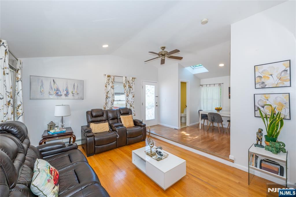 690 Garden Street Maywood, NJ 07607 - Photo 20 of 49 a living room with furniture and wooden floor