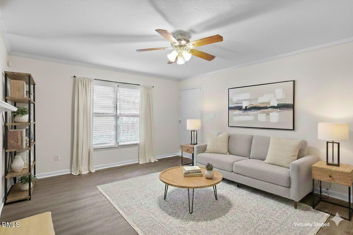 a living room with furniture and a table