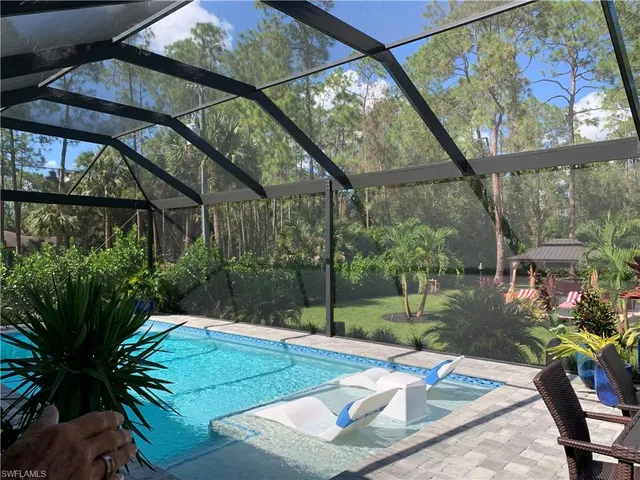 a view of a backyard with garden