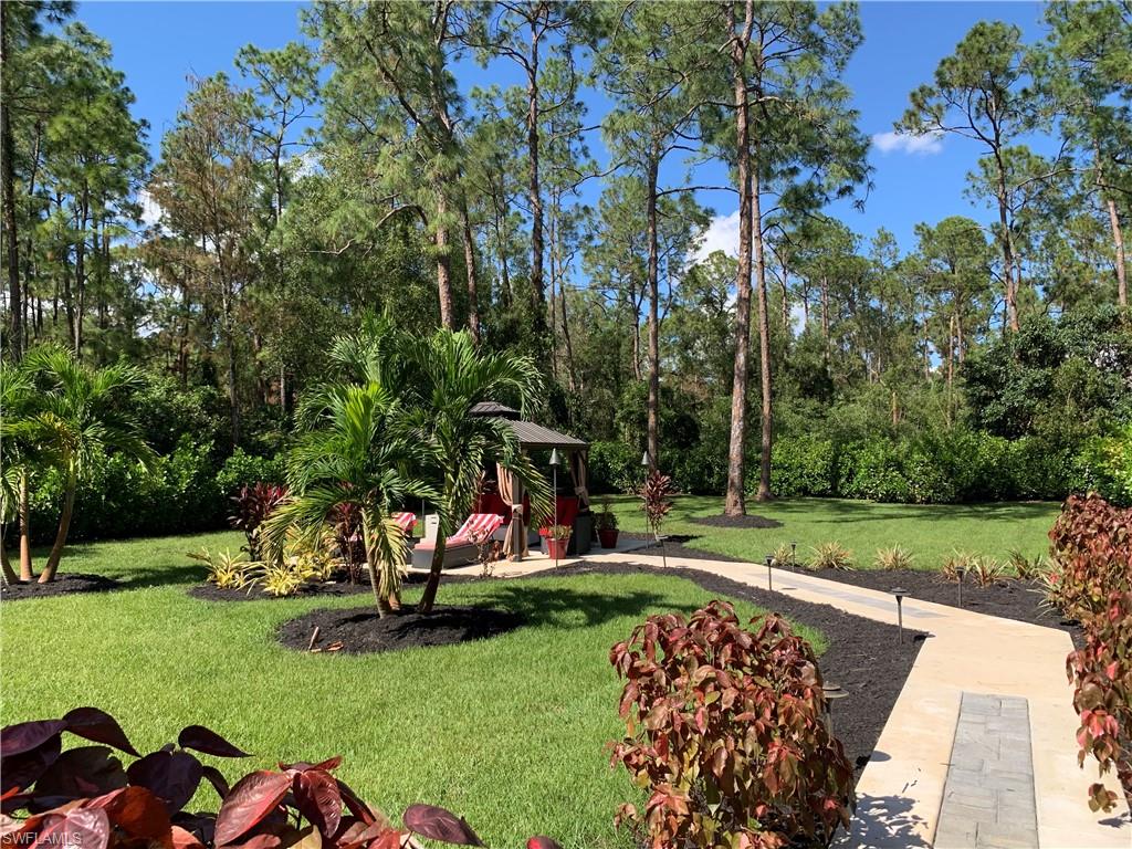 3651 29th Avenue Southwest Naples, FL 34117 - Photo 11 of 49 a view of a park with large trees