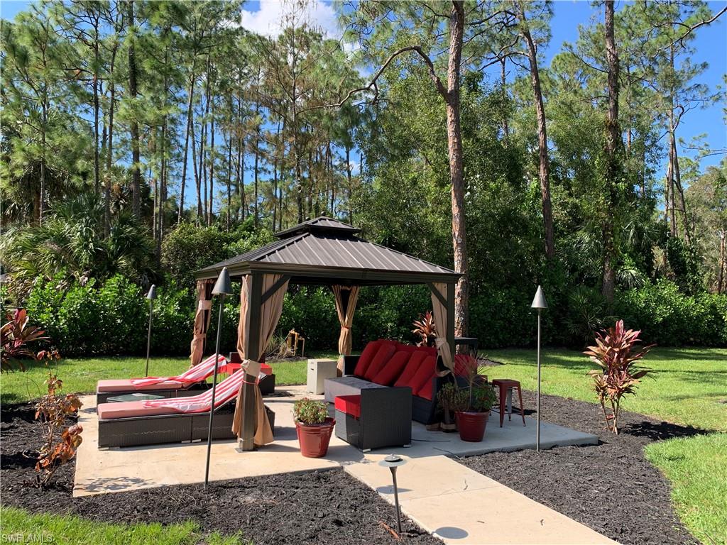 3651 29th Avenue Southwest Naples, FL 34117 - Photo 13 of 49 a view of a park with furniture