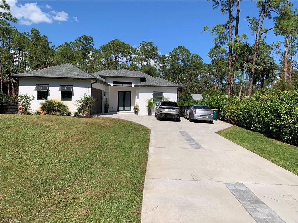 3651 29th Avenue Southwest Naples, FL 34117 - Photo 4 of 49 a view of a house with a patio