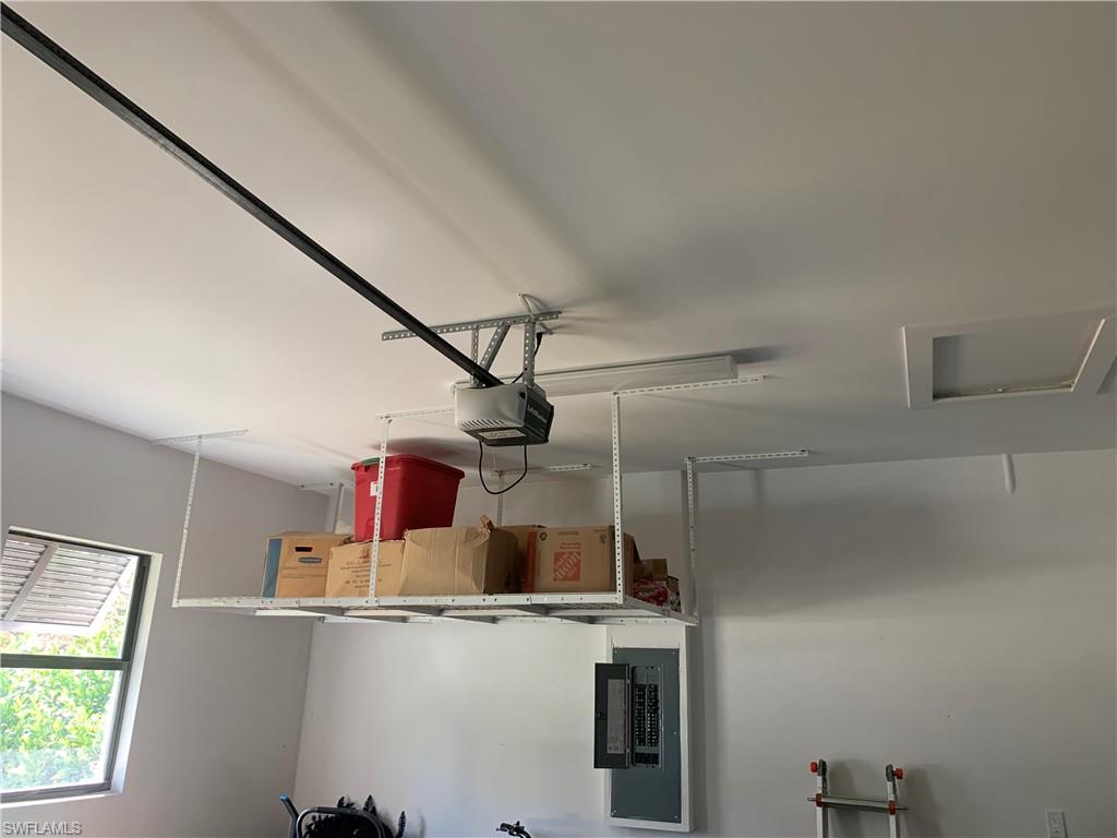 3651 29th Avenue Southwest Naples, FL 34117 - Photo 46 of 49 a kitchen with a refrigerator and window