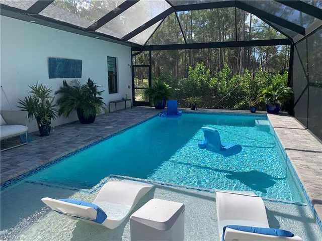 a backyard of a house with seating space