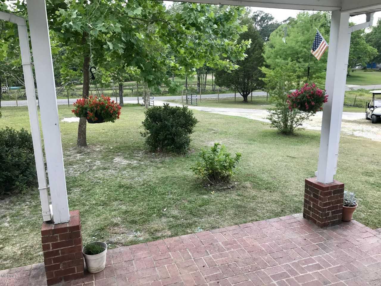 19300 Pete Hickman Road Saucier, MS 39574 - Photo 5 of 32 porch