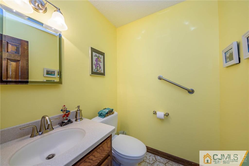 4 Tower Road Pompton Lakes, NJ 07442 - Photo 13 of 25 a bathroom with a sink and a toilet