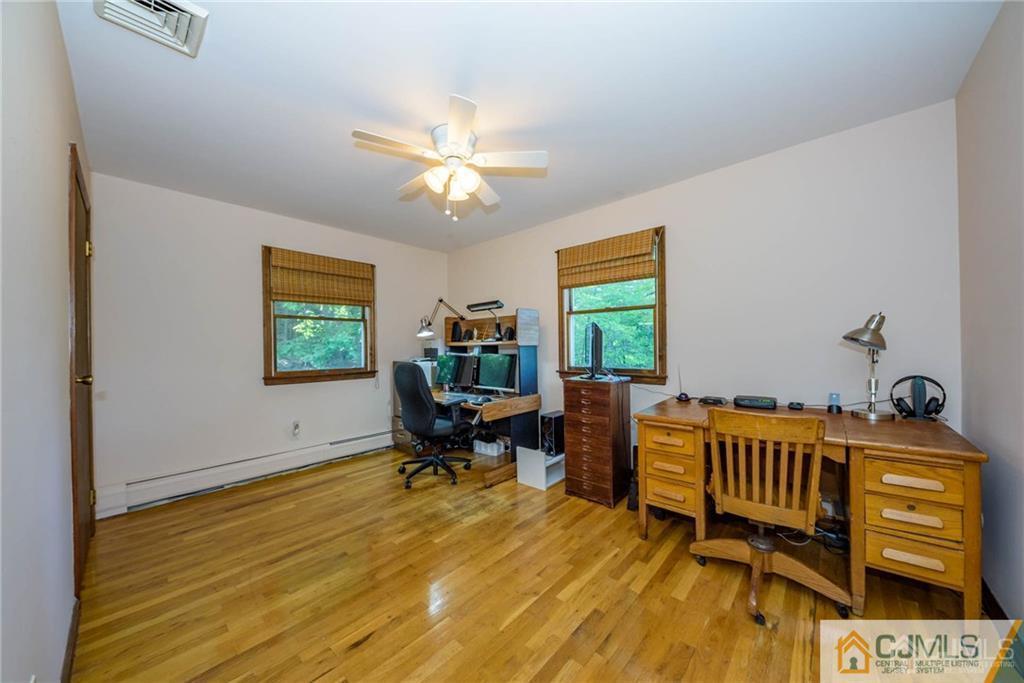 4 Tower Road Pompton Lakes, NJ 07442 - Photo 15 of 25 a bedroom with a bed and a window