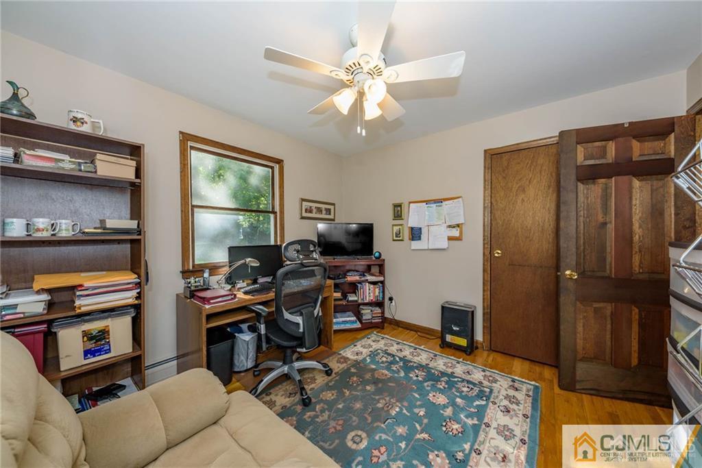 4 Tower Road Pompton Lakes, NJ 07442 - Photo 16 of 25 a view of a workspace with furniture and a livingroom