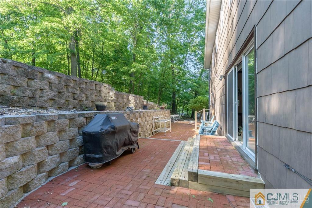 4 Tower Road Pompton Lakes, NJ 07442 - Photo 23 of 25 a view of a backyard with sitting area