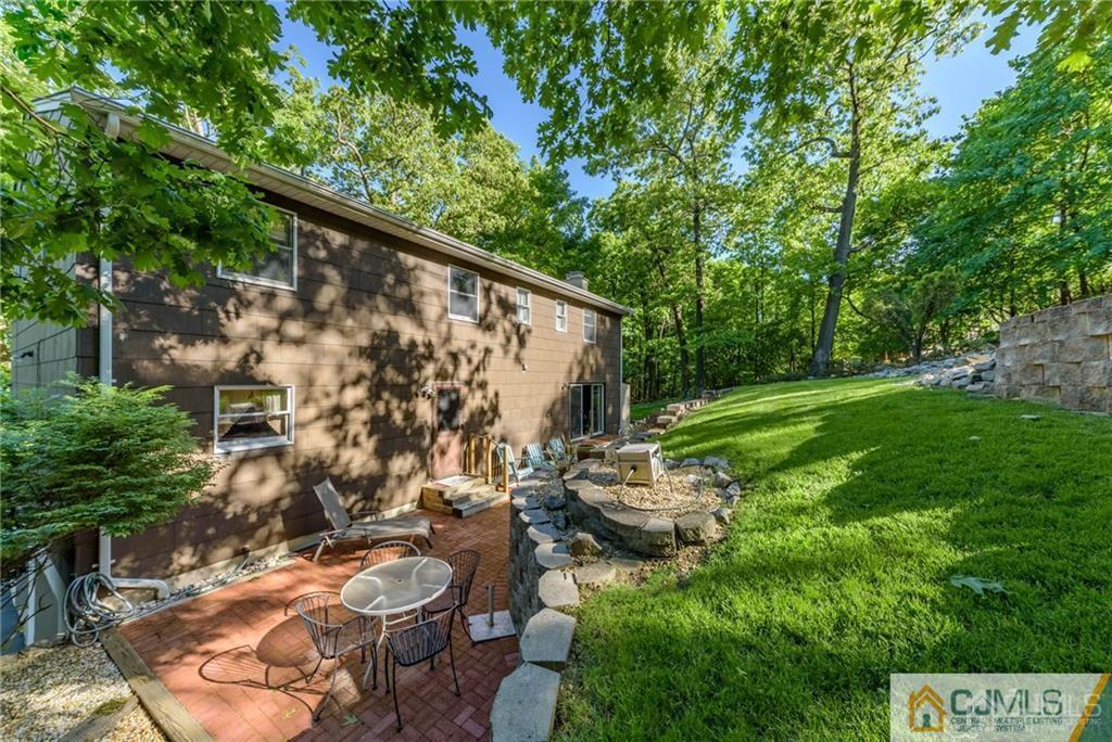 4 Tower Road Pompton Lakes, NJ 07442 - Photo 24 of 25 a backyard of a house with lots of green space